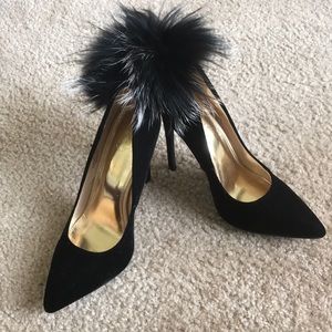 Black Stiletto pumps with fur ball
